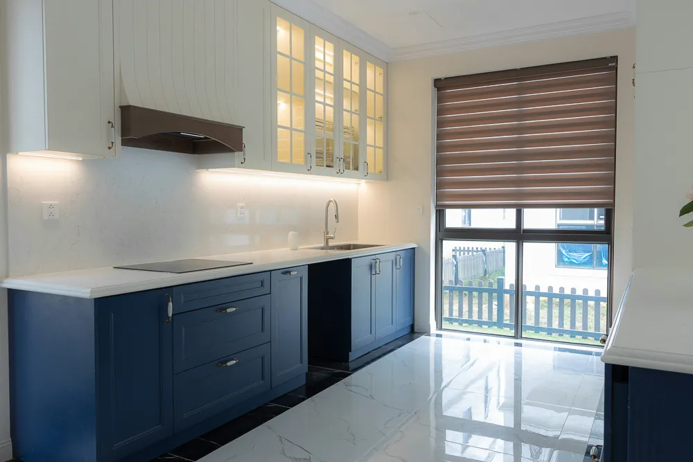 Refinished blue kitchen cabinets